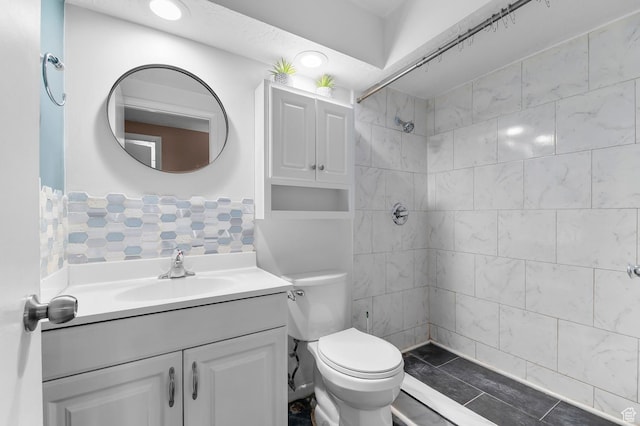 2011 W Todd Way S, Taylorsville, UT 84129 - bathroom featuring vanity, tiled shower, toilet, and recessed lighting
