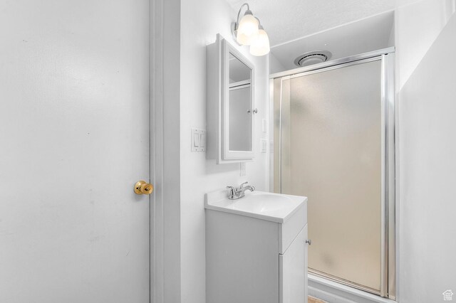 2011 W Todd Way S, Taylorsville, UT 84129 - bathroom with vanity and a stall shower