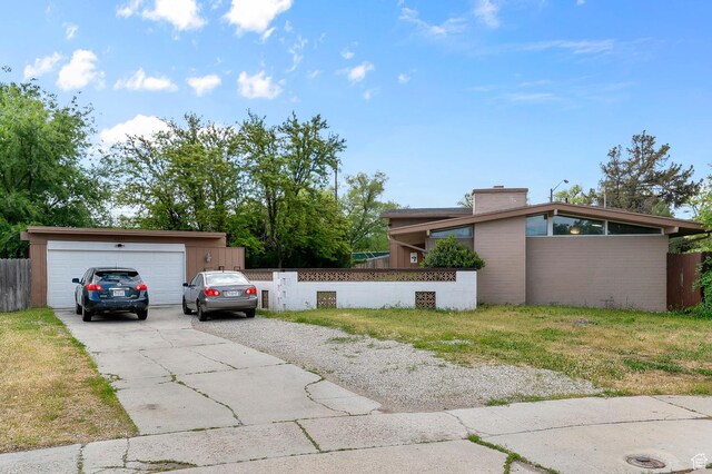 2011 W Todd Way S, Taylorsville, UT 84129 - view of front of property with driveway and a chimney