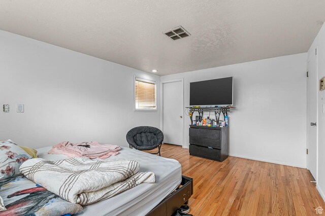 2011 W Todd Way S, Taylorsville, UT 84129 - bedroom with light wood-type flooring, baseboards, and recessed lighting