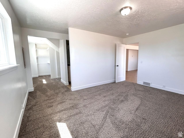45 E 300 N, Roosevelt, UT 84066 - unfurnished room with carpet and a textured ceiling