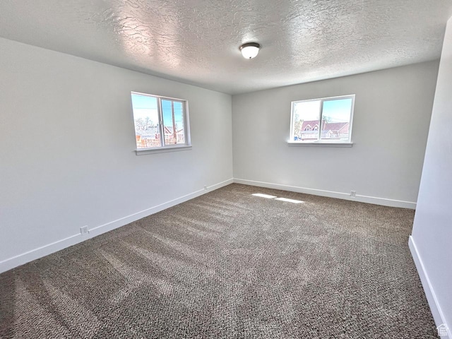 45 E 300 N, Roosevelt, UT 84066 - carpeted empty room featuring a textured ceiling and baseboards