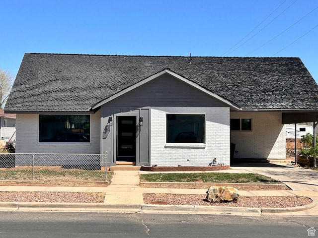 45 E 300 N, Roosevelt, UT 84066 - bungalow featuring brick siding, a carport, and driveway