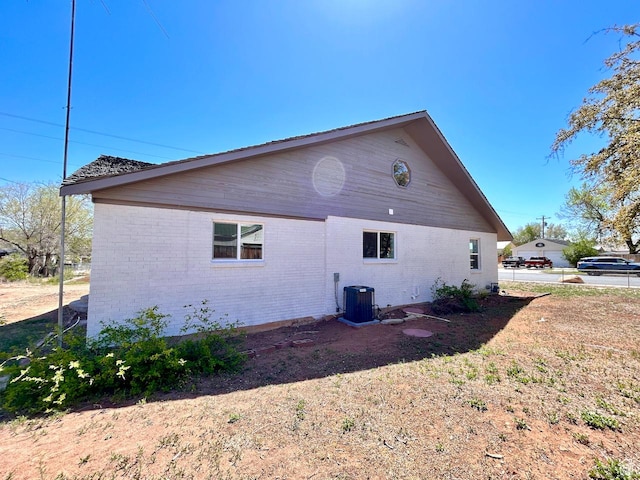 45 E 300 N, Roosevelt, UT 84066 - view of home's exterior with brick siding and a central AC unit