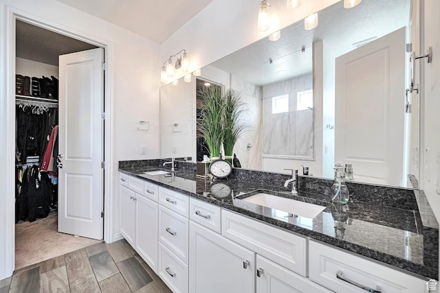2178 S 60 E Unit 37, Heber City, UT 84032 - bathroom featuring double vanity and a spacious closet