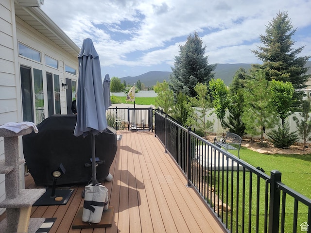 2178 S 60 E Unit 37, Heber City, UT 84032 - deck featuring a mountain view, a yard, and grilling area