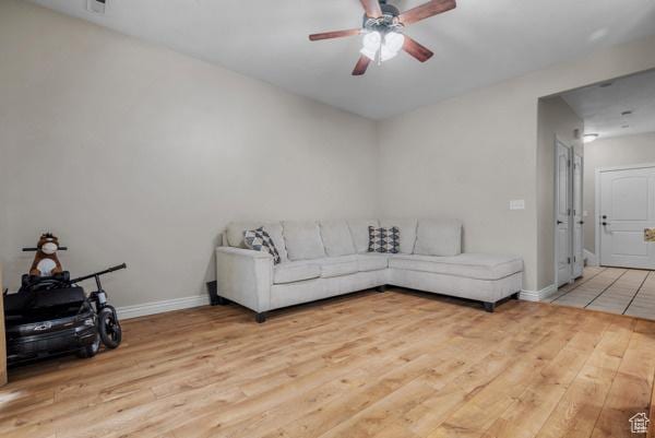 861 W 310 S, Pleasant Grove, UT 84062 - living room with wood finished floors, ceiling fan, and baseboards
