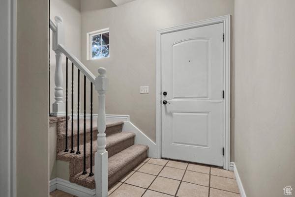 861 W 310 S, Pleasant Grove, UT 84062 - entrance foyer featuring baseboards, light tile patterned flooring, and stairs