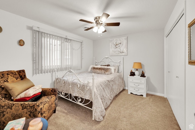 980 E 5475 S, South Ogden, UT 84405 - carpeted bedroom featuring a closet, baseboards, and a ceiling fan