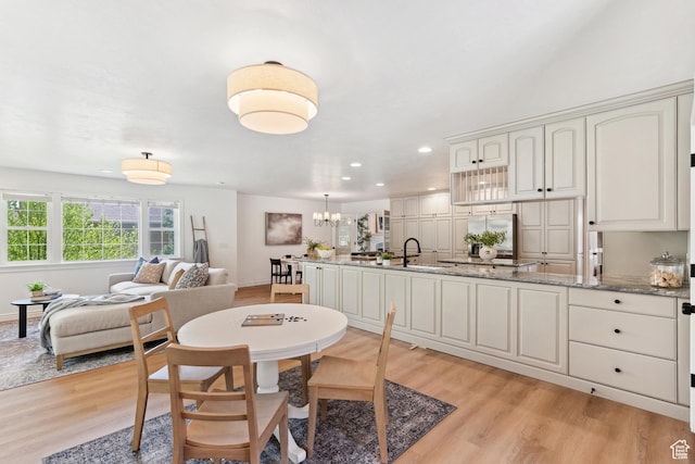 573 S Cherry Ln, Fruit Heights, UT 84037 - dining area with light wood-type flooring, recessed lighting, a chandelier, and baseboards