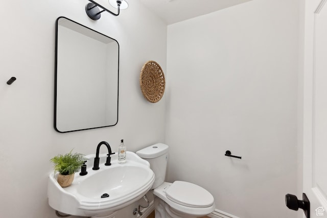 573 S Cherry Ln, Fruit Heights, UT 84037 - half bath featuring a sink and toilet