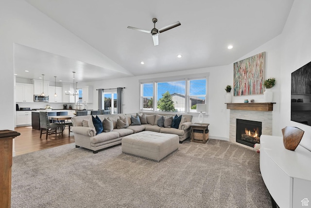 3507 S 4875 W, West Haven, UT 84401 - carpeted living room featuring a ceiling fan, recessed lighting, a lit fireplace, and high vaulted ceiling