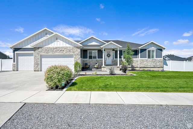 3507 S 4875 W, West Haven, UT 84401 - view of front of house with stone siding, board and batten siding, concrete driveway, and an attached garage