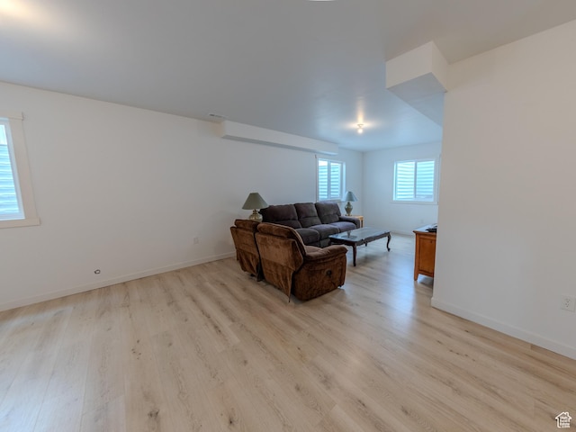 1622 N Baen Way E, Tooele, UT 84074 - living room featuring light wood-style floors and baseboards