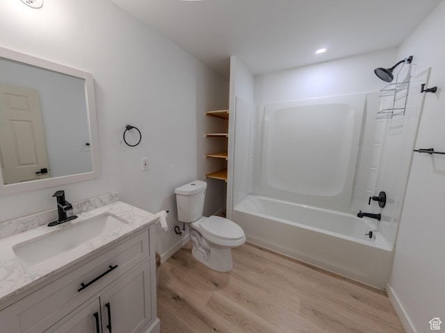 1622 N Baen Way E, Tooele, UT 84074 - bathroom with wood finished floors, toilet, bathing tub / shower combination, vanity, and baseboards