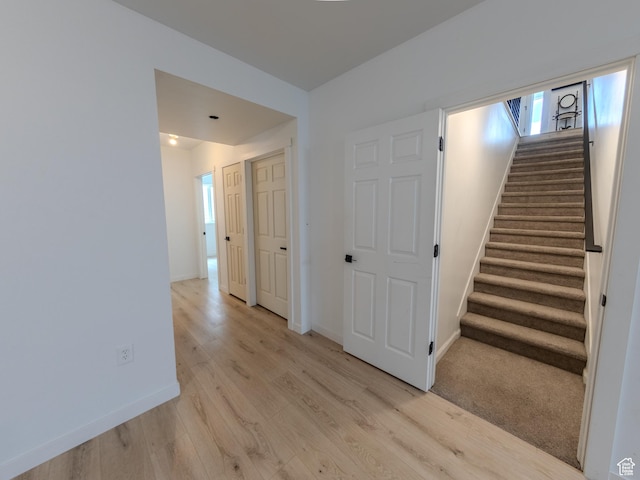 1622 N Baen Way E, Tooele, UT 84074 - stairs with wood finished floors and baseboards