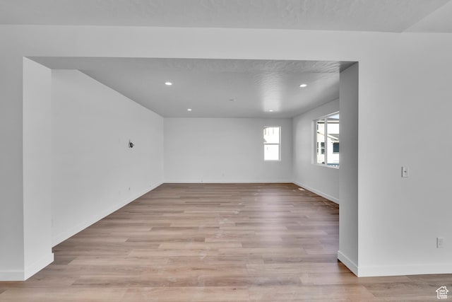 139 E Heron Ave S Unit 809, Saratoga Springs, UT 84045 - spare room featuring light wood-style floors, baseboards, and recessed lighting