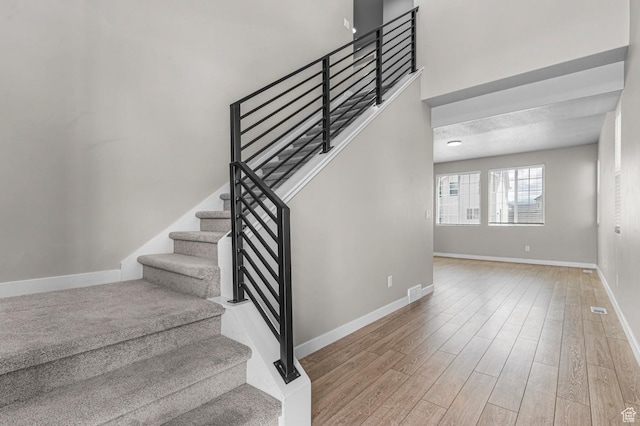 2293 W Prevedel Dr, West Haven, UT 84401 - stairway with wood finished floors and baseboards