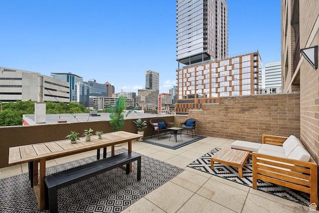 230 E Broadway E Unit 403, Salt Lake City, UT 84111 - view of patio / terrace featuring a city view and outdoor dining space