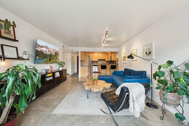 230 E Broadway E Unit 403, Salt Lake City, UT 84111 - living room featuring finished concrete floors and rail lighting