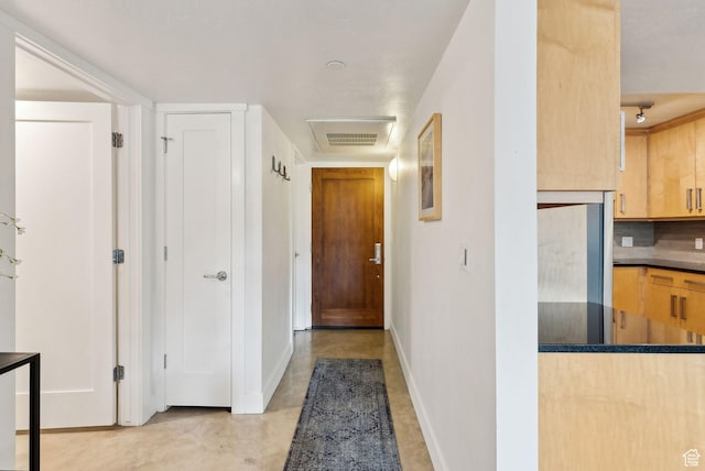 230 E Broadway E Unit 403, Salt Lake City, UT 84111 - hallway featuring baseboards and finished concrete floors
