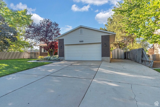 3236 W New World Dr S, West Jordan, UT 84084 - view of front facade featuring concrete driveway and brick siding