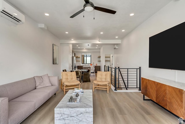4186 S Main St Unit N220, Millcreek, UT 84107 - living area with an AC wall unit, light wood finished floors, a ceiling fan, and recessed lighting