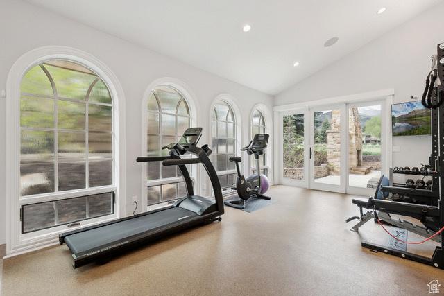 4891 Last Stand Dr, Snyderville, UT 84098 - workout area featuring vaulted ceiling, recessed lighting, and french doors