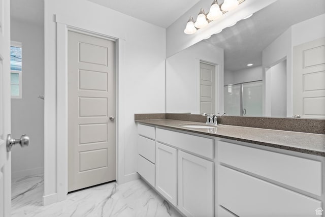 1689 S Haven Pkwy, West Haven, UT 84401 - full bath with a shower stall, vanity, marble look tile flooring, and baseboards