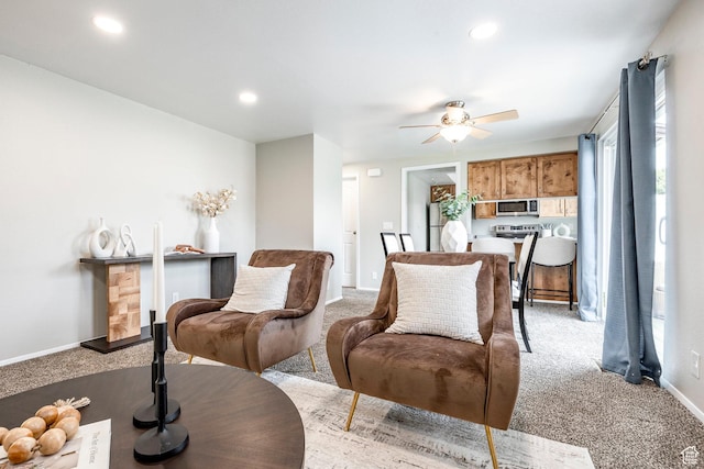 1180 W Middlesex Rd S, Taylorsville, UT 84123 - living room with light carpet, ceiling fan, recessed lighting, and baseboards