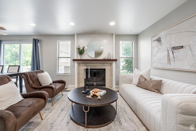 1180 W Middlesex Rd S, Taylorsville, UT 84123 - living area with wood finished floors, recessed lighting, a high end fireplace, and baseboards