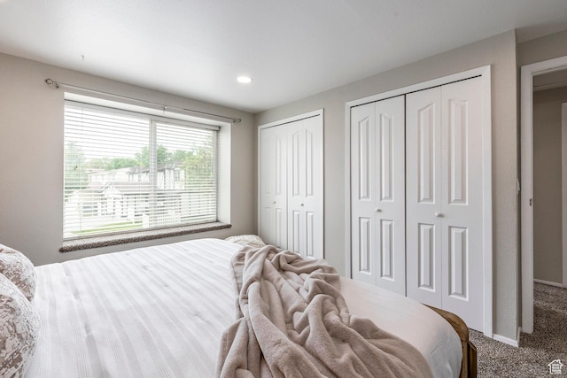 1180 W Middlesex Rd S, Taylorsville, UT 84123 - bedroom featuring two closets, carpet flooring, and recessed lighting