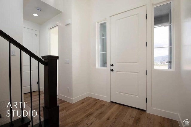 4883 N 10 E, Enoch, UT 84721 - entryway with baseboards, wood finished floors, and stairway