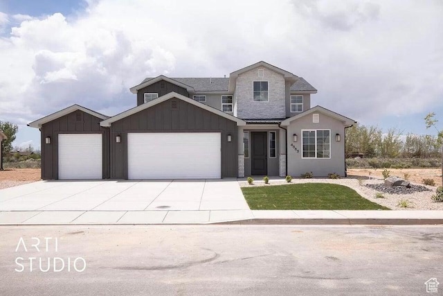 4883 N 10 E, Enoch, UT 84721 - view of front of property with a garage, board and batten siding, concrete driveway, a front yard, and stone siding
