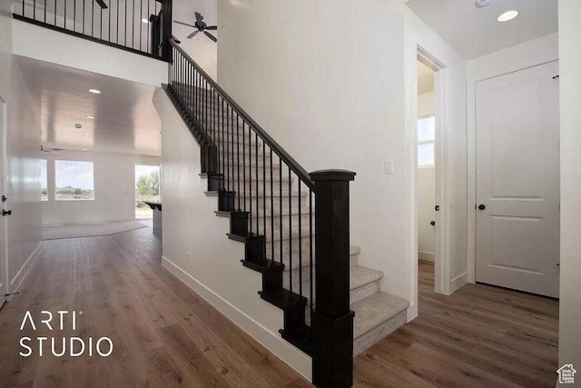 4883 N 10 E, Enoch, UT 84721 - stairway featuring wood finished floors, baseboards, and a ceiling fan
