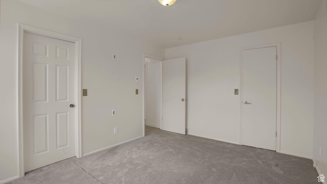 2976 S Laree St, West Valley City, UT 84120 - unfurnished bedroom featuring carpet and baseboards