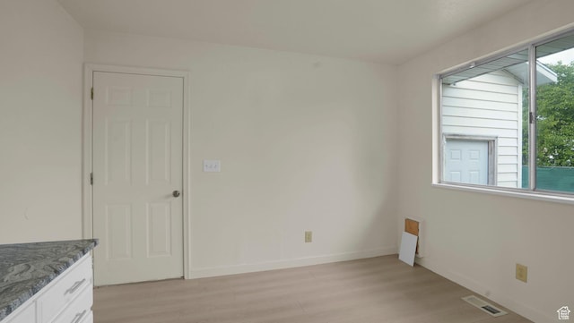 2976 S Laree St, West Valley City, UT 84120 - unfurnished room featuring light wood finished floors and baseboards