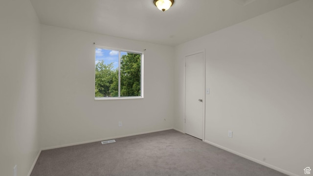 2976 S Laree St, West Valley City, UT 84120 - carpeted empty room featuring baseboards