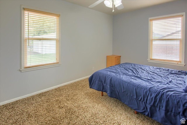 708 Robins Ave, Ogden, UT 84404 - bedroom with carpet, baseboards, and ceiling fan