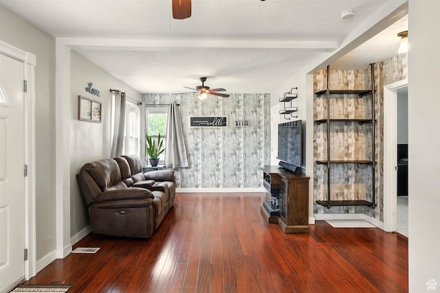 575 5th St, Ogden, UT 84404 - living room with a ceiling fan, baseboards, wood finished floors, wallpapered walls, and beam ceiling