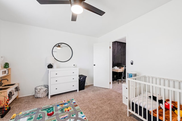 88 W 50 S Unit L5, Centerville, UT 84014 - bedroom featuring carpet floors, a nursery area, and ceiling fan