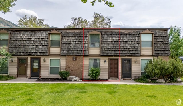 88 W 50 S Unit L5, Centerville, UT 84014 - townhome / multi-family property with mansard roof and a front yard