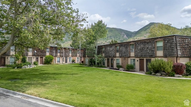 88 W 50 S Unit L5, Centerville, UT 84014 - surrounding community with a mountain view and a yard