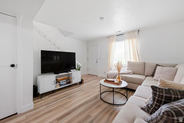 88 W 50 S Unit L5, Centerville, UT 84014 - living area featuring light wood-style flooring and baseboards
