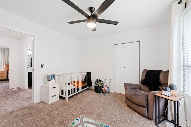 88 W 50 S Unit L5, Centerville, UT 84014 - carpeted bedroom with multiple windows, a closet, ceiling fan, and a crib