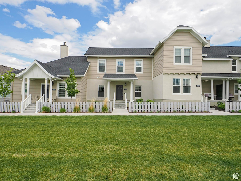 11003 S Kestrel Rise Rd, South Jordan, UT 84009 - view of front of property with a chimney, covered porch, and roof with shingles