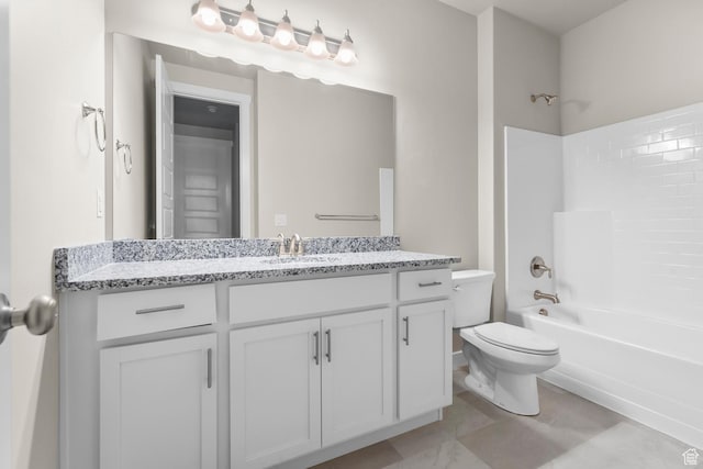 full bathroom featuring toilet, shower / bathtub combination, and vanity