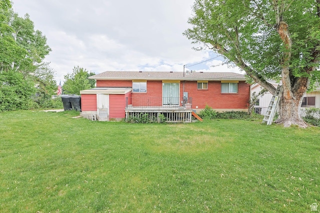 263 E 1350 N, Bountiful, UT 84010 - back of property featuring brick siding, a yard, and a deck