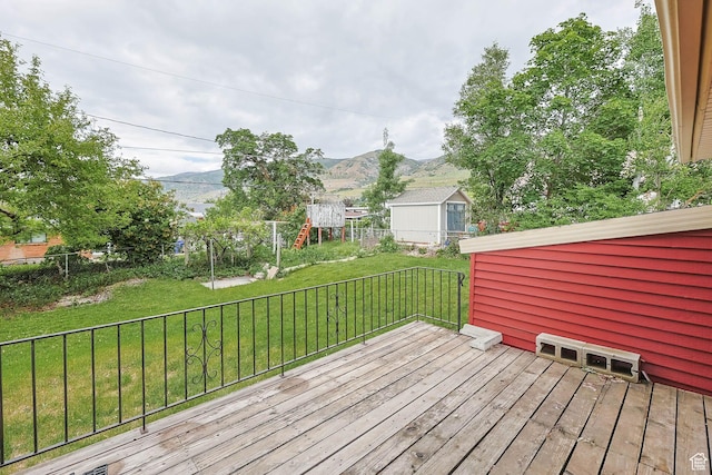 263 E 1350 N, Bountiful, UT 84010 - wooden terrace with a mountain view and a playground