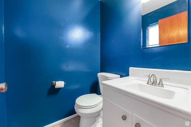 263 E 1350 N, Bountiful, UT 84010 - half bathroom with toilet, vanity, and wood finished floors
